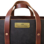 Brass Colored Plate Affixed to Leather Bag +$20.00